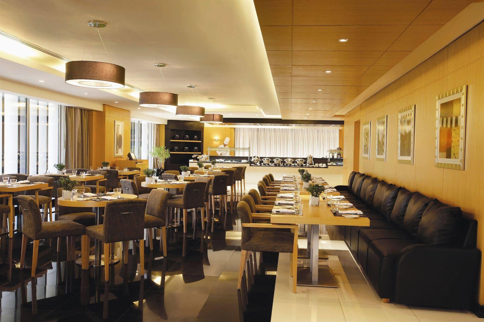 Hala Arjaan By Rotana, Deluxe Hotel Apartments Abu Dhabi Restoran gambar